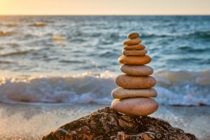 Concept of balance and harmony - stone stack on the beach